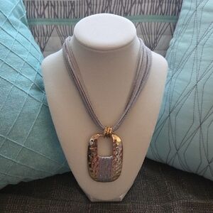 Elegant Gold and Silver Pendant Necklace